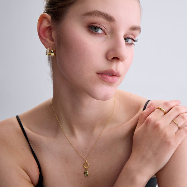 VFD0951 Geometric Oval Tag Charm